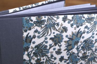 Photo album with Italian colored paper as cover and linen spine